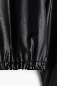 Veste en tissu enduit