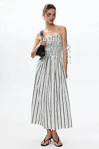 Robe avec bretelles à nouer et corsage smocké