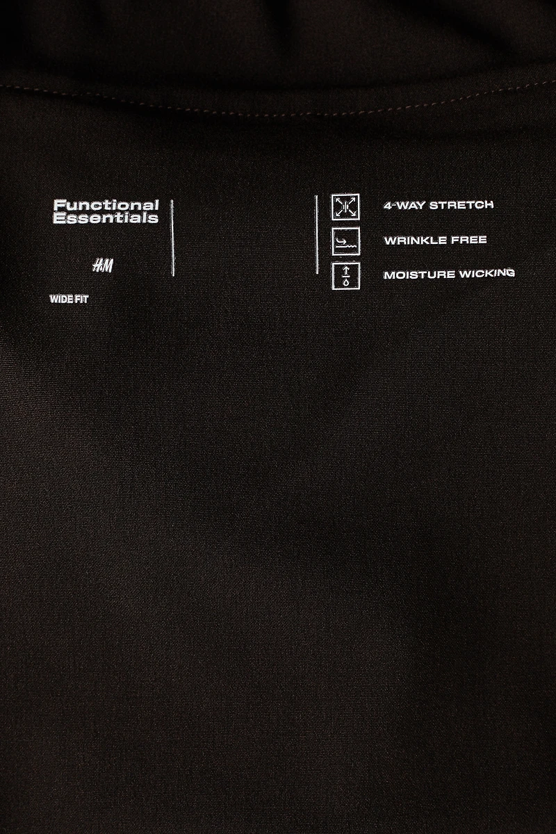 Pantalon large à taille élastique quatre sens