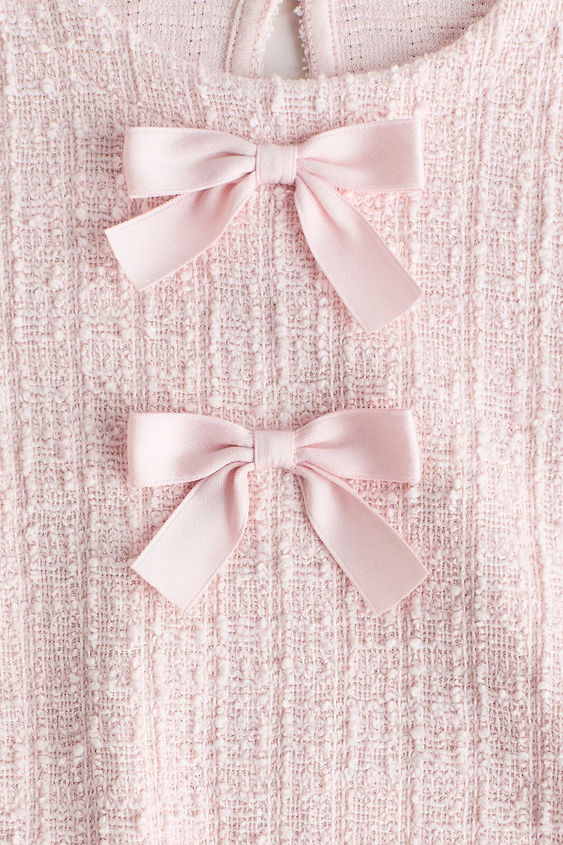 Robe en tissu bouclette avec boucles