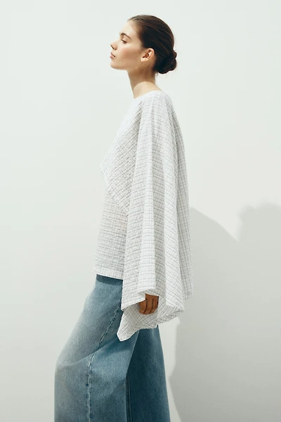 Blouse en crépon avec cape