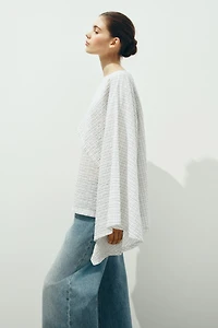 Blouse en crépon avec cape