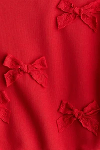 Chandail à l'intérieur brossé avec appliqués