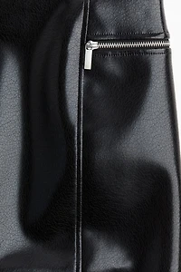 Jupe crayon en tissu enduit