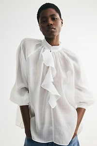 Blouse à volant en lyocell mélangé