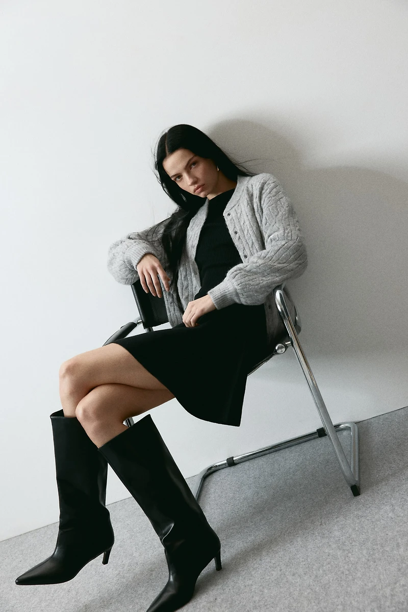 Blouson aviateur en tricot torsadé