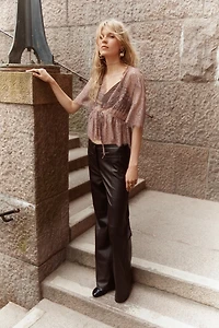 Pantalon en tissu enduit