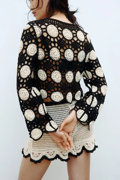 Crochet-look hole-knit top