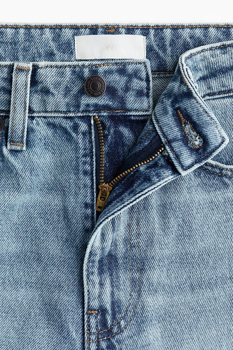 Jean à la cheville coupe tonneau et taille haute