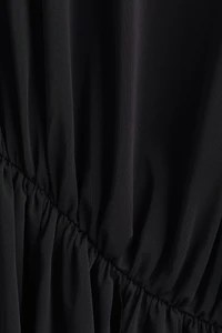 Haut asymétrique à effet drapé