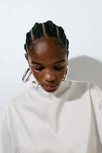 Robe en satin à effet drapé