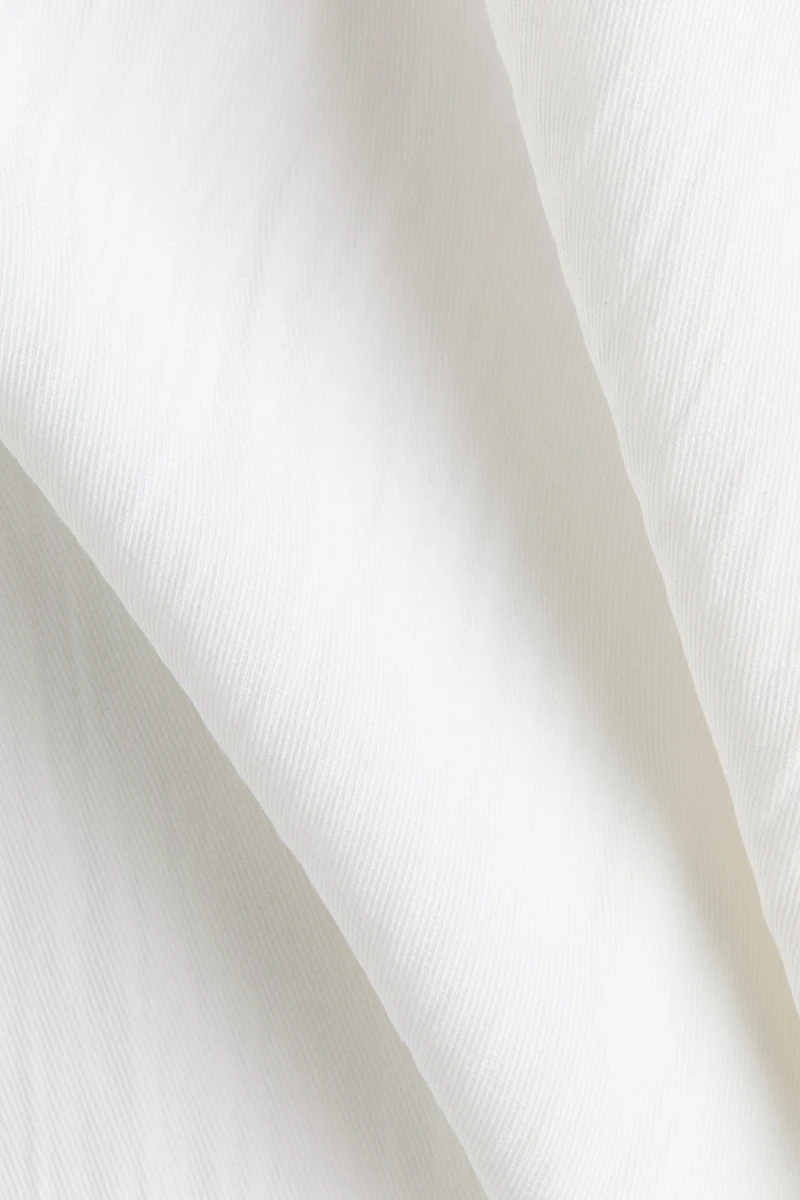 Wide-Leg Ruffle-Trimmed Pants
