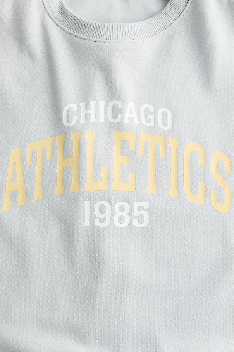 Sweatshirt with Text Motif