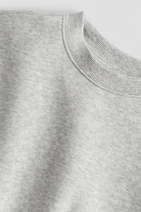 Chandail grande taille avec encolure ras-du-cou