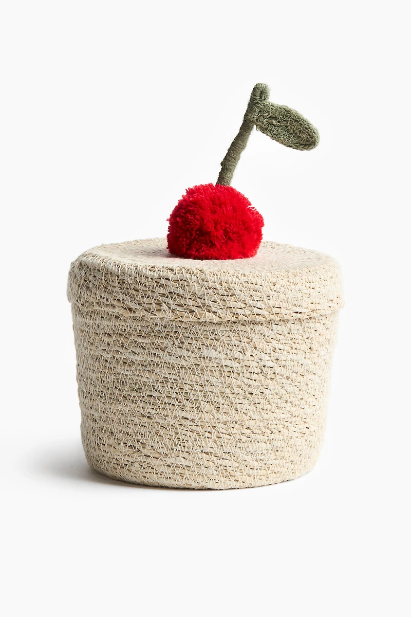 Petit panier en jonc de mer avec pompon