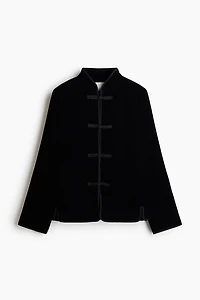 Veste en velours avec boutons noués