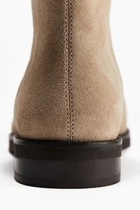 Bottines en cuir à mi-mollet