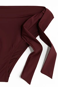 Bas de maillot taille haute avec détail à nouer
