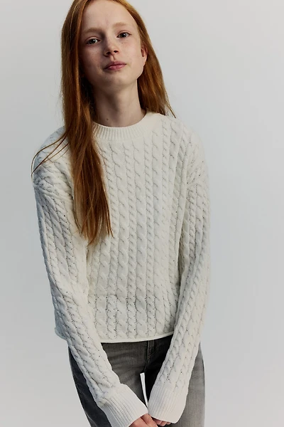 Chandail en tricot torsadé
