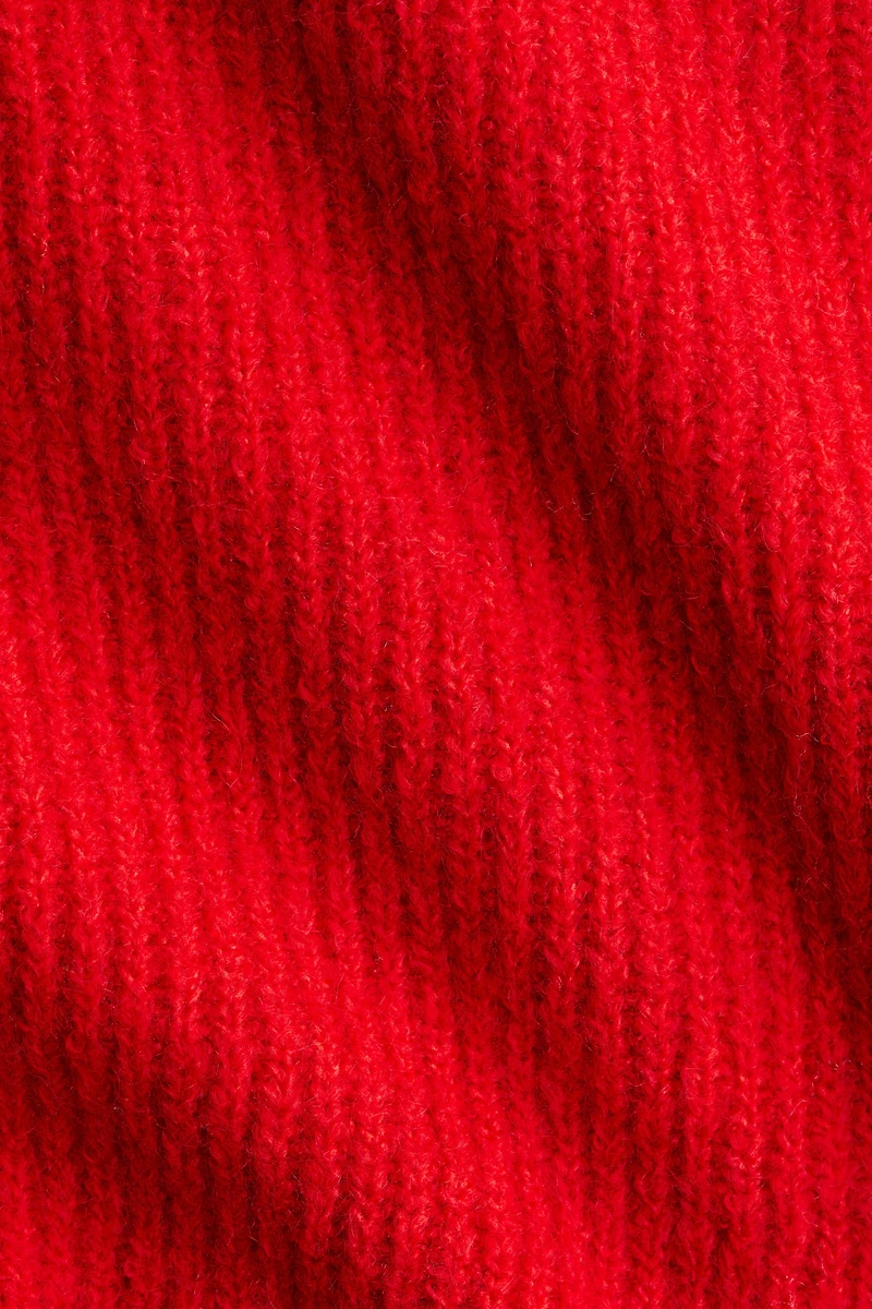 Haut péplum en tricot côtelé