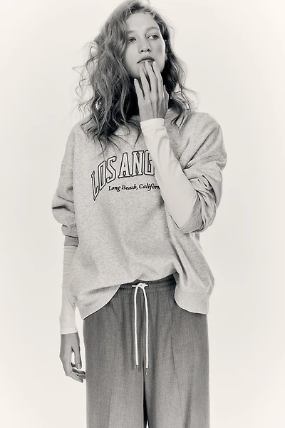 Sweatshirt with Text Motif