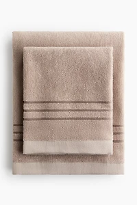 Serviette de bain en coton éponge