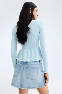 Haut péplum en tricot