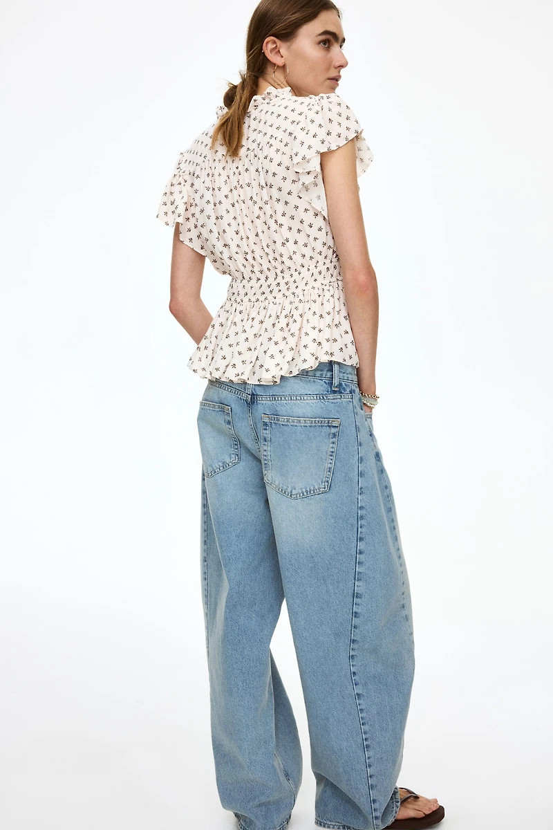 Flutter-Sleeved Peplum Blouse