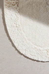 Tapis de bain ovale avec dessus touffeté