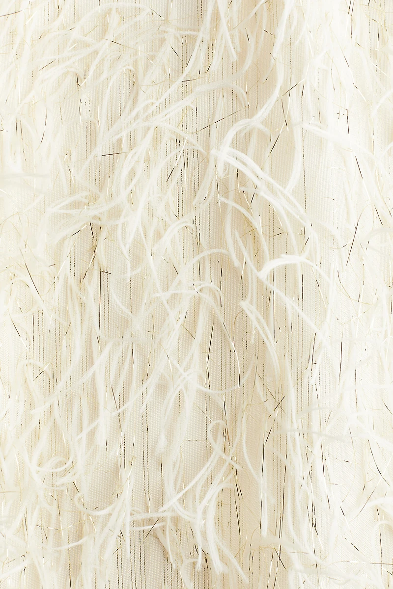 Robe à franges scintillantes