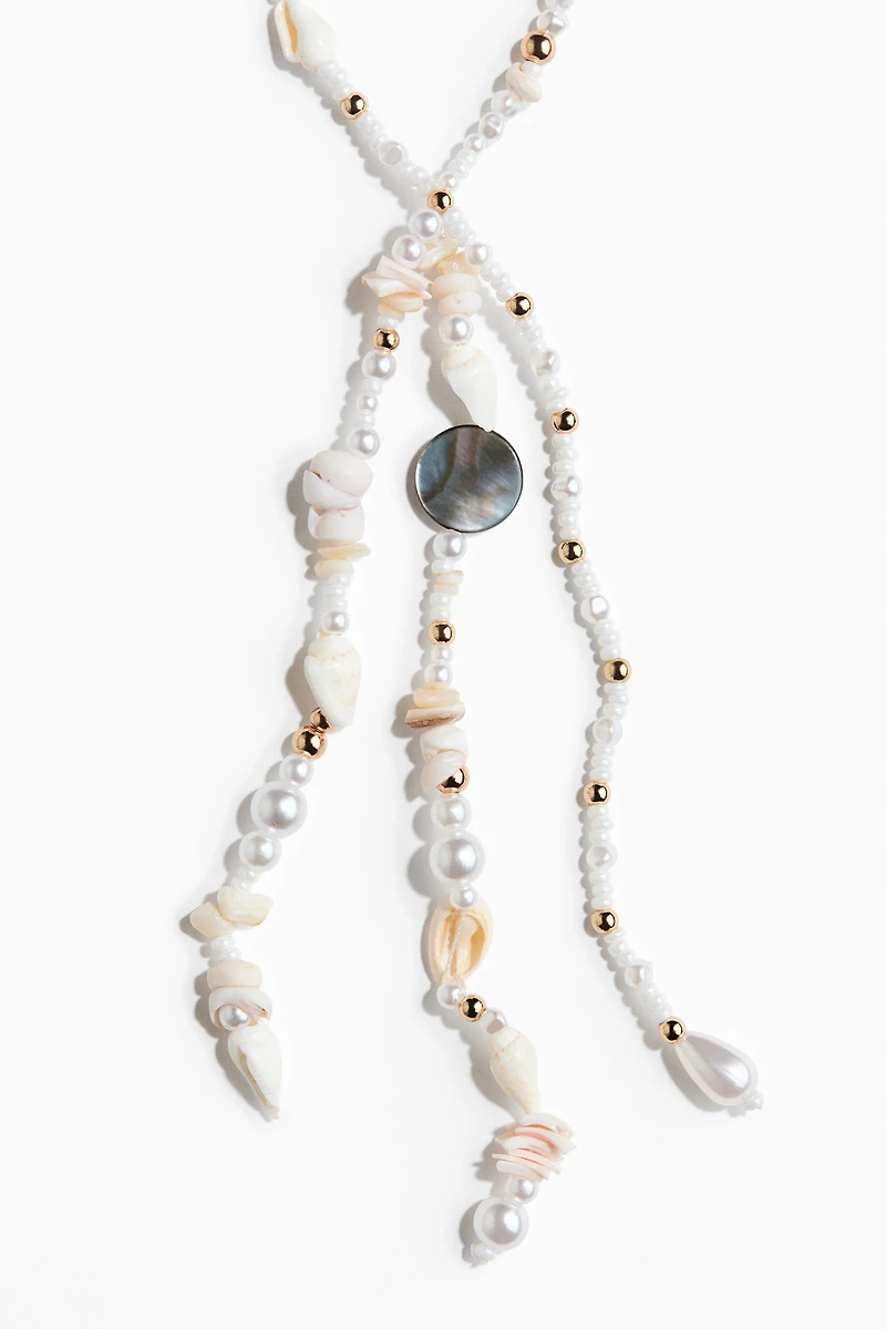 Collier avec perles fantaisie