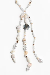 Collier avec perles fantaisie