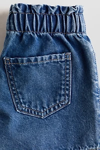 Short en denim à motifs brodés