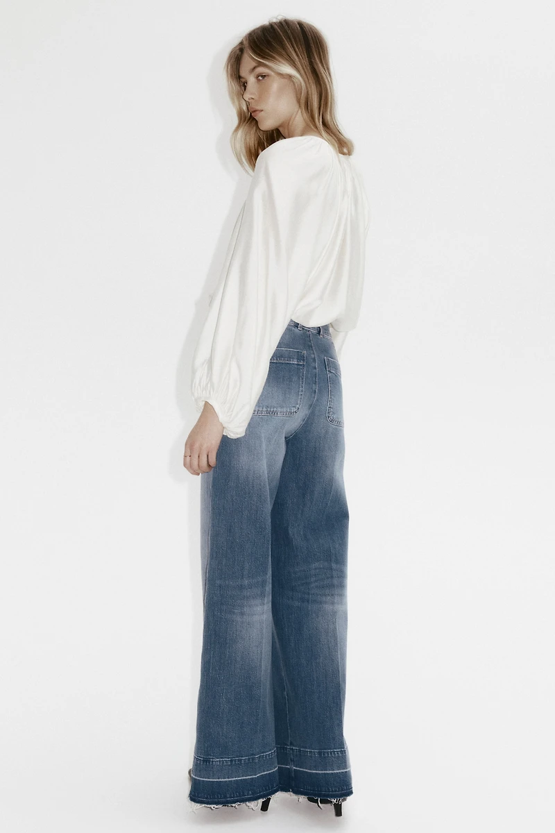 Jean taille haute avec jambes larges