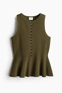 Chandail péplum sans manches en tricot côtelé