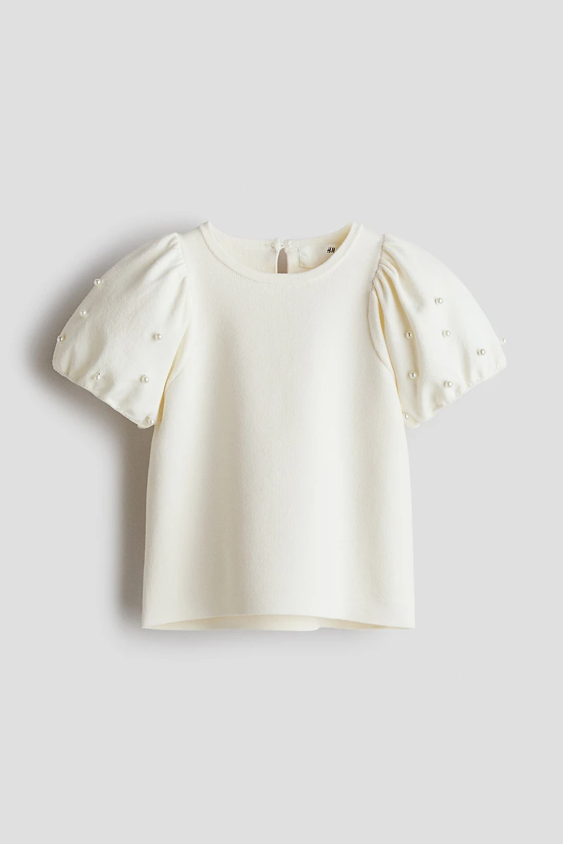 Haut en fin tricot avec perles de fantaisie