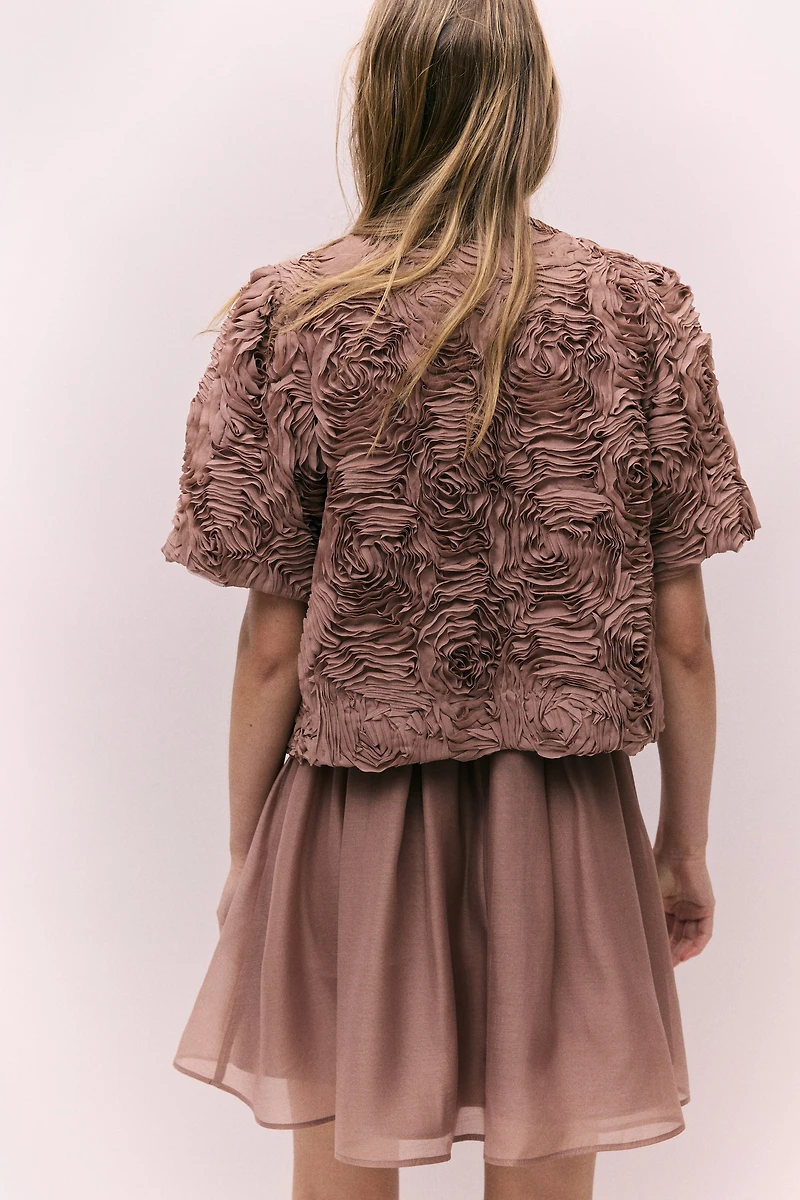 Veste avec appliqués