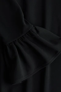 Glittery Shoulder-Pad Dress