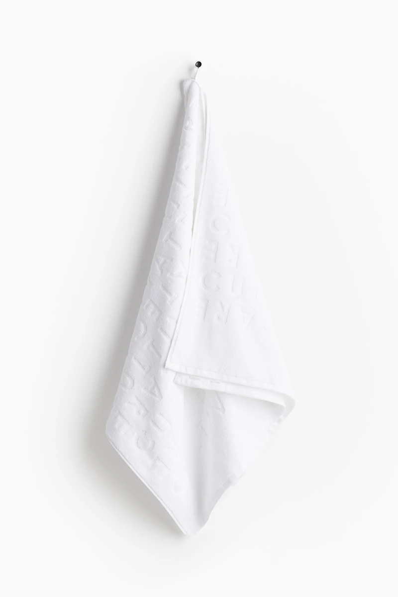 Serviette de bain en coton éponge