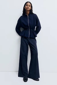 Chandail péplum à fermeture éclair