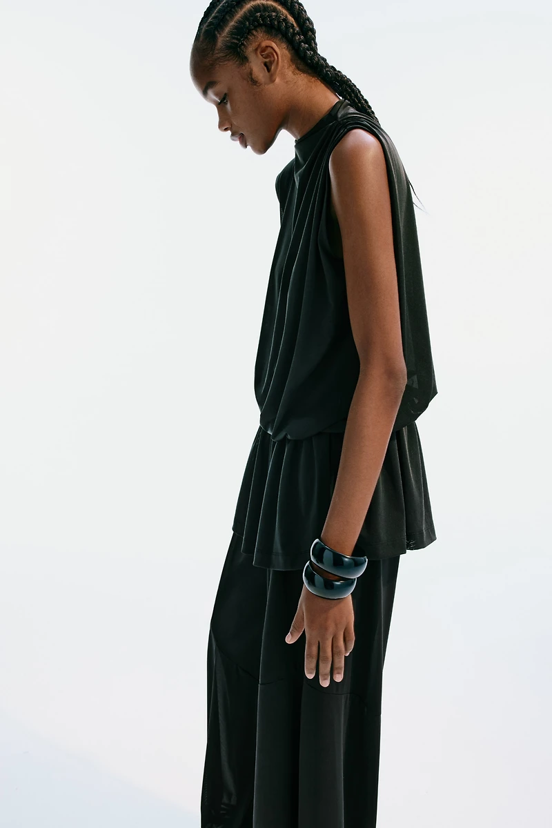 Haut asymétrique à effet drapé