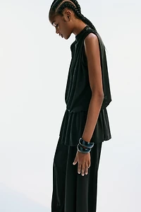 Haut asymétrique à effet drapé