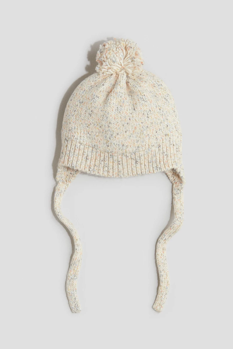 Bonnet en tricot avec rabats d'oreilles