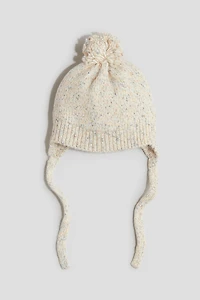 Bonnet en tricot avec rabats d'oreilles