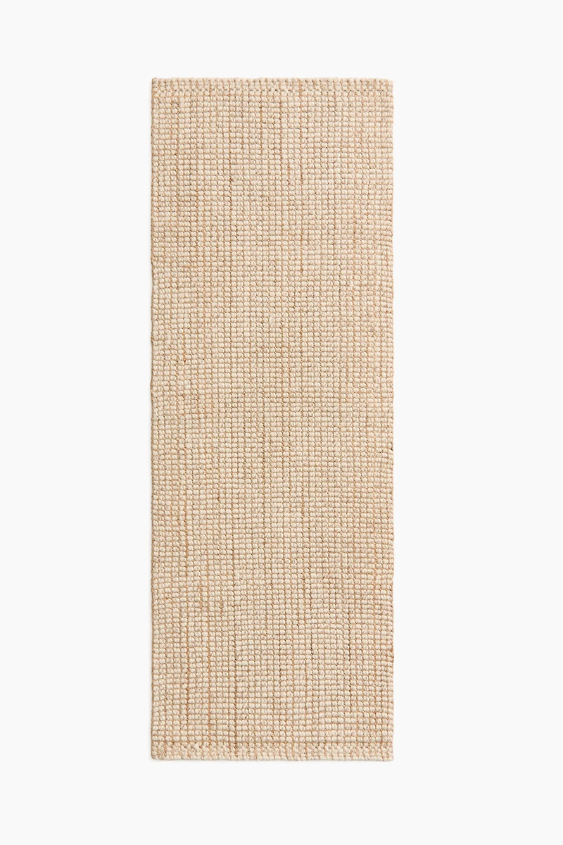 Tapis long en tissu bouclette de laine mélangée