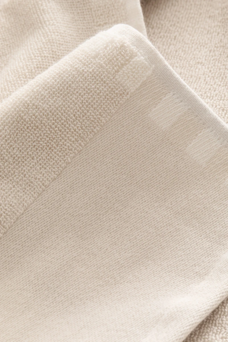 Serviette de plage rayée en coton