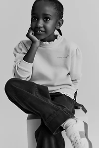 Chandail en molleton volanté