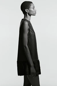 Minirobe en tissu enduit