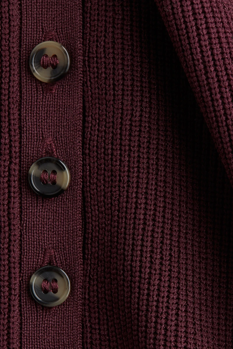 Rib-Knit Peplum Sleeveless Top