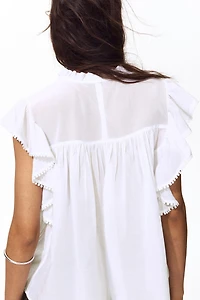 Frill-trimmed blouse